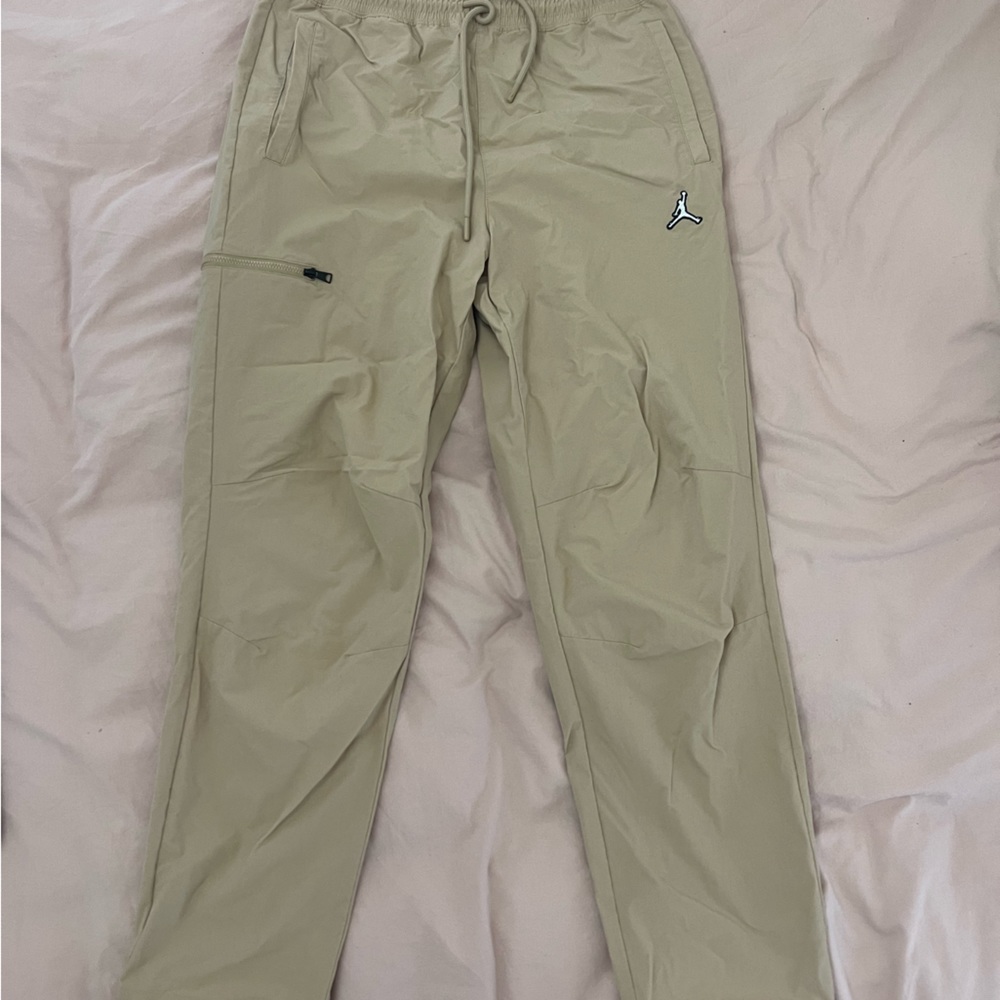 Jordan windbreaker pants - drawstrings at ankle as well - medium